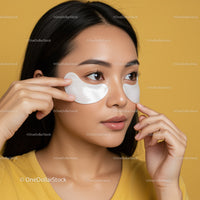 Young Woman Applying Under Eye Masks for Skin Rejuvenation