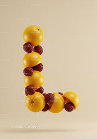 Letter L made of fresh oranges and ripe raspberries