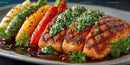 Colorful Grilled Fish Fillets with Roasted Vegetables and Herb Garnish