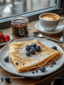 Delicious Blueberry Pancakes with Fresh Fruit and Coffee