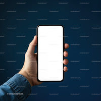 Hand holding smartphone with blank white screen