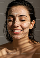 Close-up of Woman Smiling with Clear Glowing Skin and Facial Mask