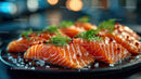 Fresh Sliced Smoked Salmon with Herbs and Sea Salt on Black Plate