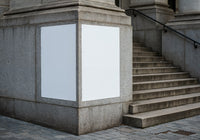 Blank Posters on Stone Wall Near Urban Staircase
