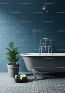 Elegant freestanding bathtub with lush green plant