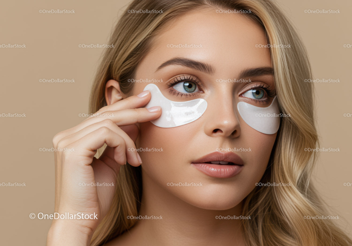 Close-Up of Young Woman Applying Under-Eye Gel Patches for Skincare
