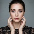 Close-up Portrait of Young Woman with Blue Eyes and Natural Makeup