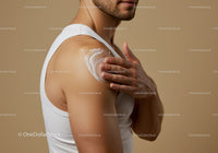 Man Applying Lotion to Shoulder for Skincare Routine
