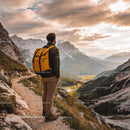 Hiker Enjoying Sunset View Over Mountain Valley