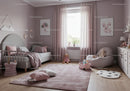 Cozy Children's Bedroom with Pink Decor and Plush Toys