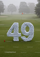 Number forty nine shaped with golf balls on course