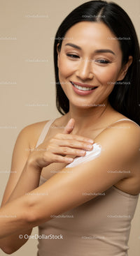 Young Woman Applying Cream to Shoulder in a Beauty Routine