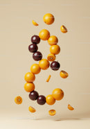 Creative Arrangement of Floating Oranges and Apples