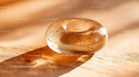 Luxurious Golden Glass Gemstone with Sparkling Glitter in Sunlight