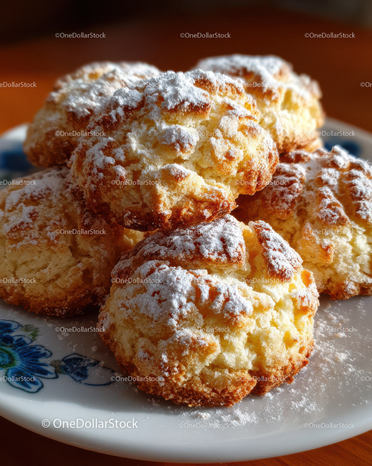 Golden Cream Puffs with Powdered Sugar and Almond Garnish for Dessert