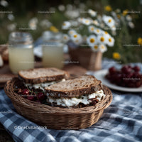 Fresh Strawberries and Wildflowers Picnic Scene in Summer Garden