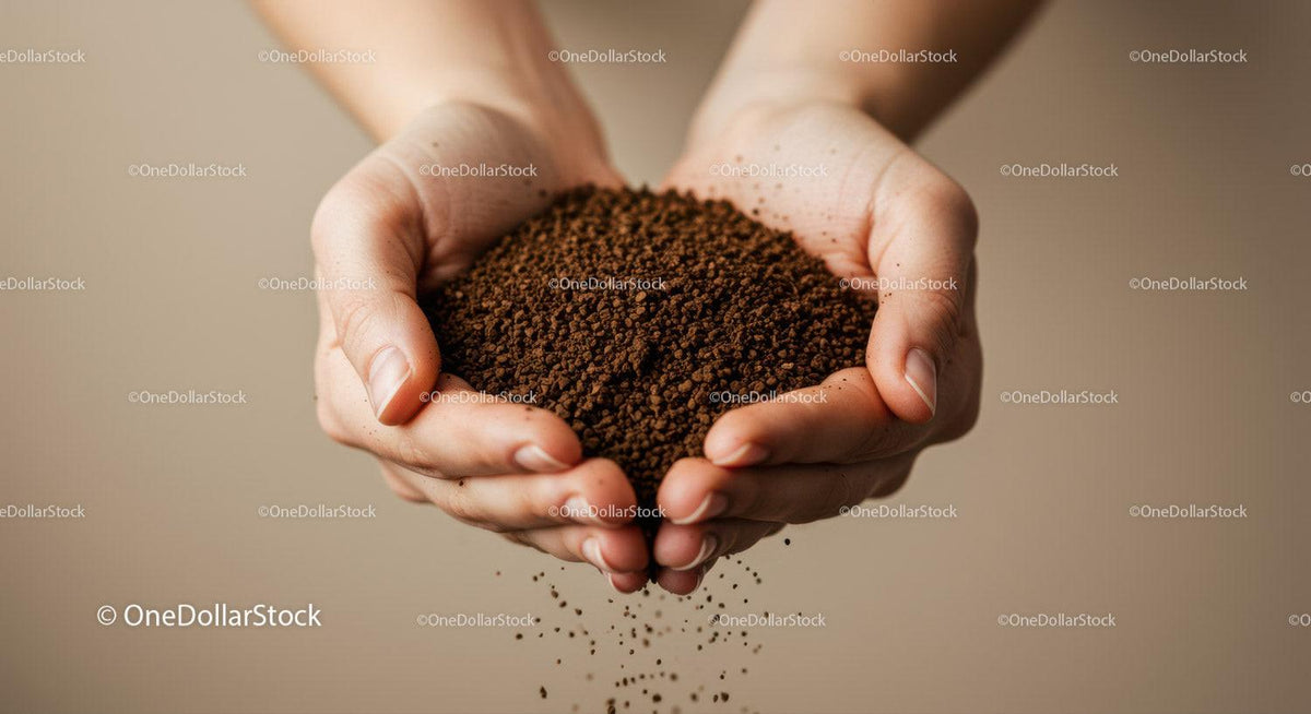 Hands gently holding falling ground coffee granules