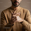 Close-Up of Man Applying Lotion on Hand in Personal Care Routine