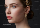 Elegant Woman with Gold Jewelry and Bright Makeup