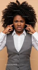 Frustrated Woman Covering Ears with Annoyed Expression