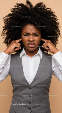 Frustrated Woman Covering Ears with Annoyed Expression