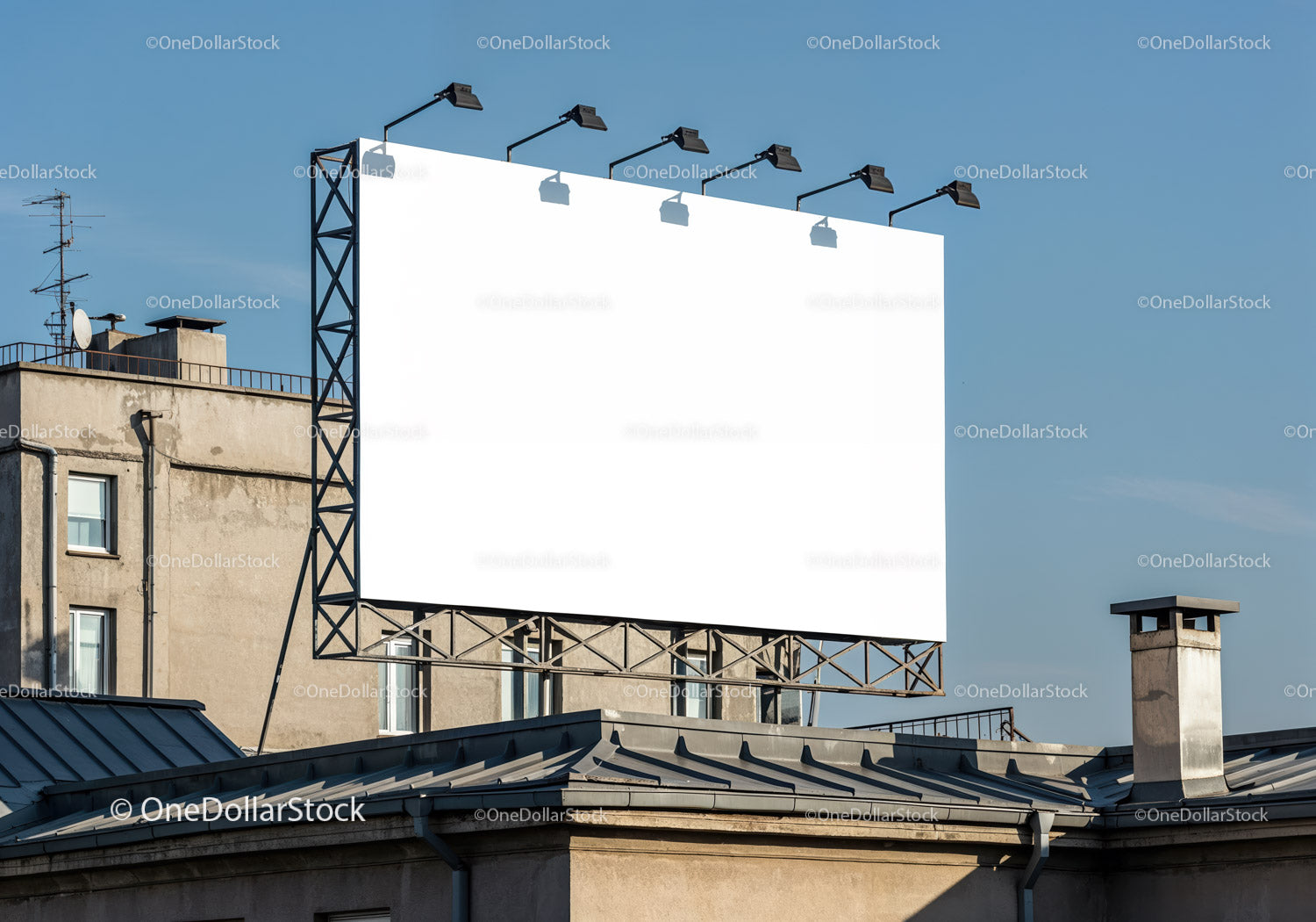 Blank urban billboard glowing under clear sky