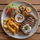 Juicy Grilled Steak with Crispy Fries and Fresh Salad Plate