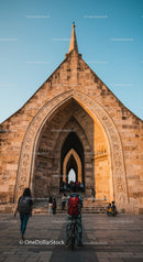 Historic Gothic Cathedral with Arched Entrance and Spire