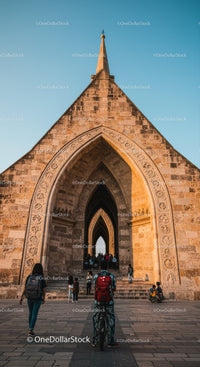 Historic Gothic Cathedral with Arched Entrance and Spire
