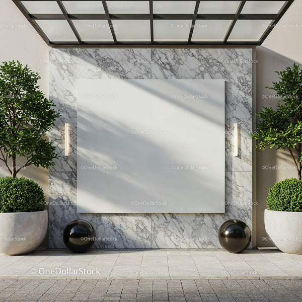 Modern outdoor wall with blank marble panel and greenery JPG Mockup Image
