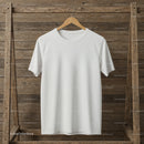 Plain white t-shirt hanging on wooden hanger