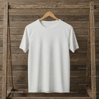 Plain white t-shirt hanging on wooden hanger
