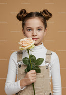 Young Girl with Pale Peach Rose Portrait on Soft Beige Background