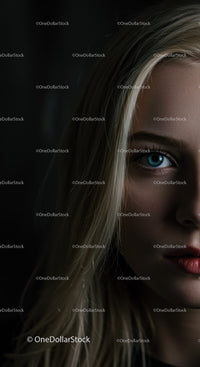 Close up portrait of thoughtful young woman with blue eyes