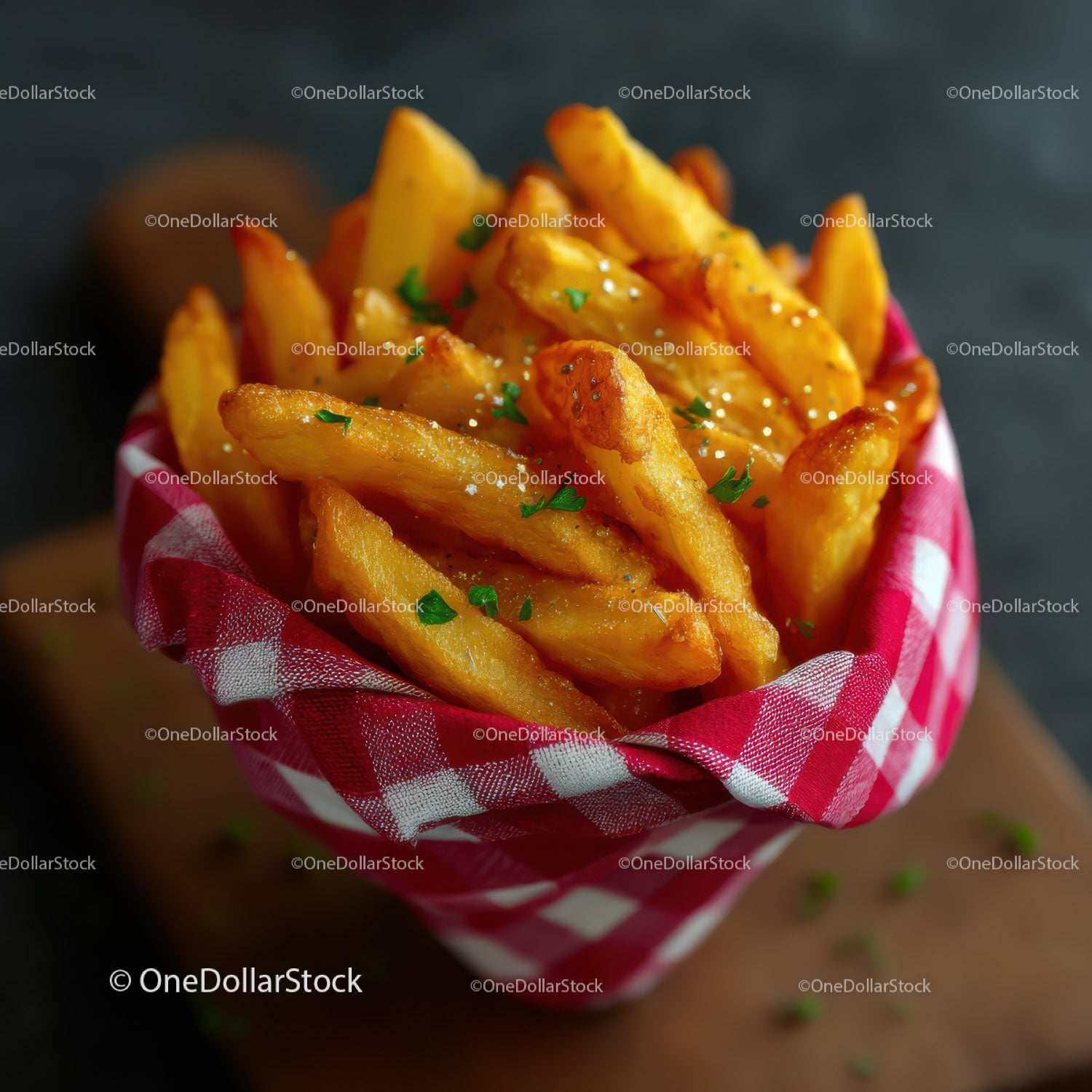 Golden French Fries in Red and White Checkered Paper Cup