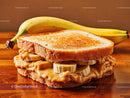 Banana and Peanut Butter Sandwich on Toast with Fresh Bananas