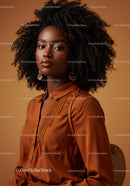 Elegant African American Woman Wearing Stylish Brown Blouse in Studio