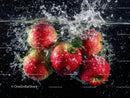 Fresh Red Apples Splashing into Water with Dynamic Motion