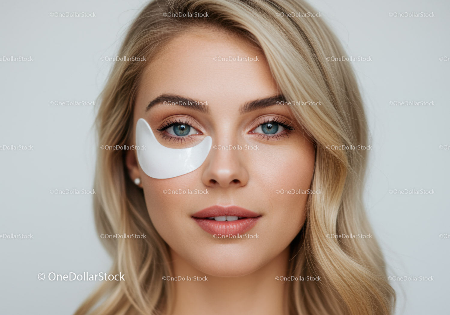 Close-up of a Woman with Blue Eyes Wearing a Facial Mask