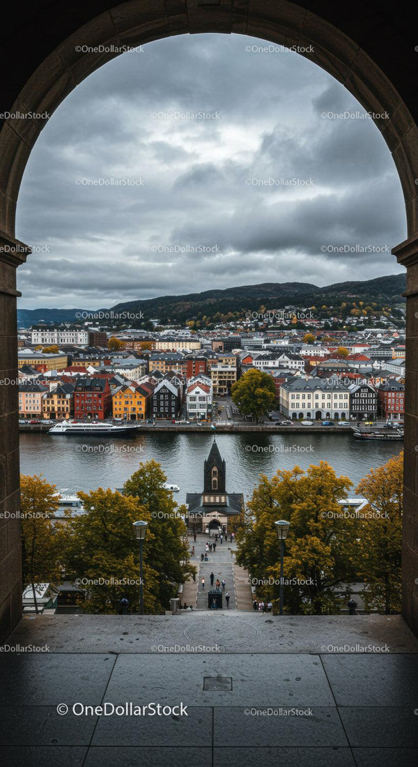 Colorful Waterfront Cityscape with River and Mountain Background
