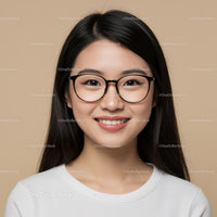 Elegant Young Woman in Glasses with Friendly Smile and Modern Look