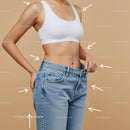 Slim Woman Measuring Waist in Casual Denim Jeans and White Sports Bra