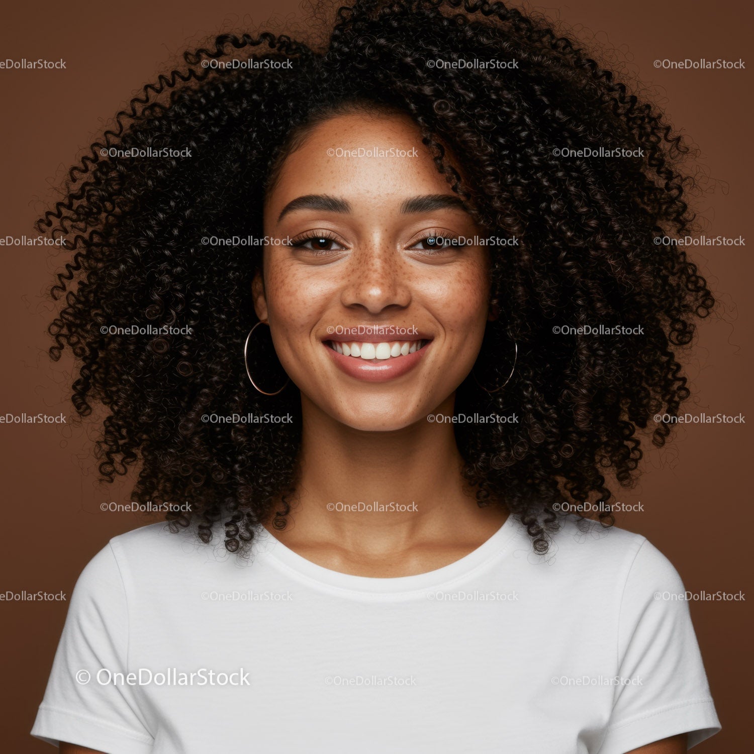Portrait of a Smiling Woman with Curly Hair and Hoop Earrings