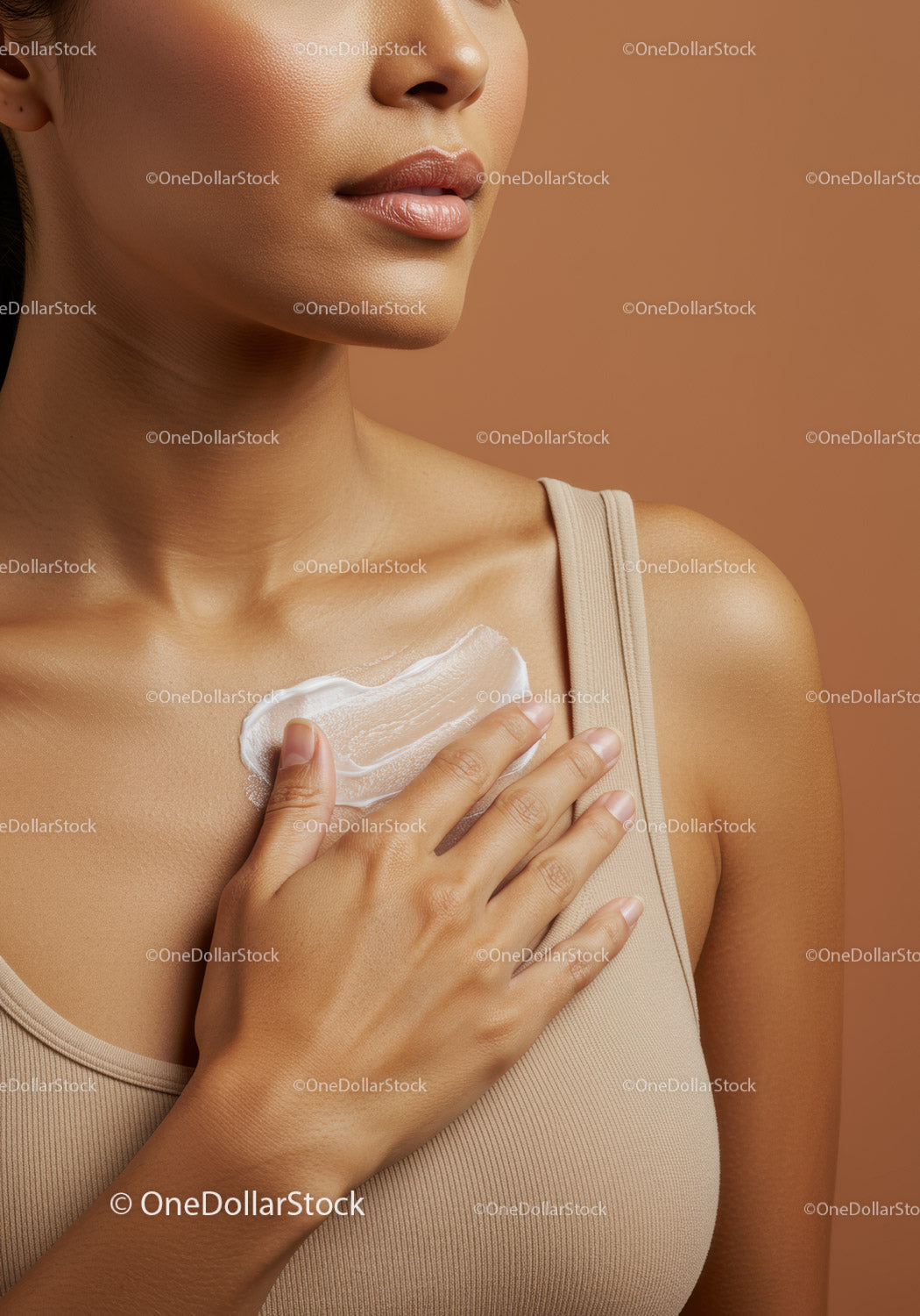 Close-Up of Woman Applying Body Lotion with Smooth Skin