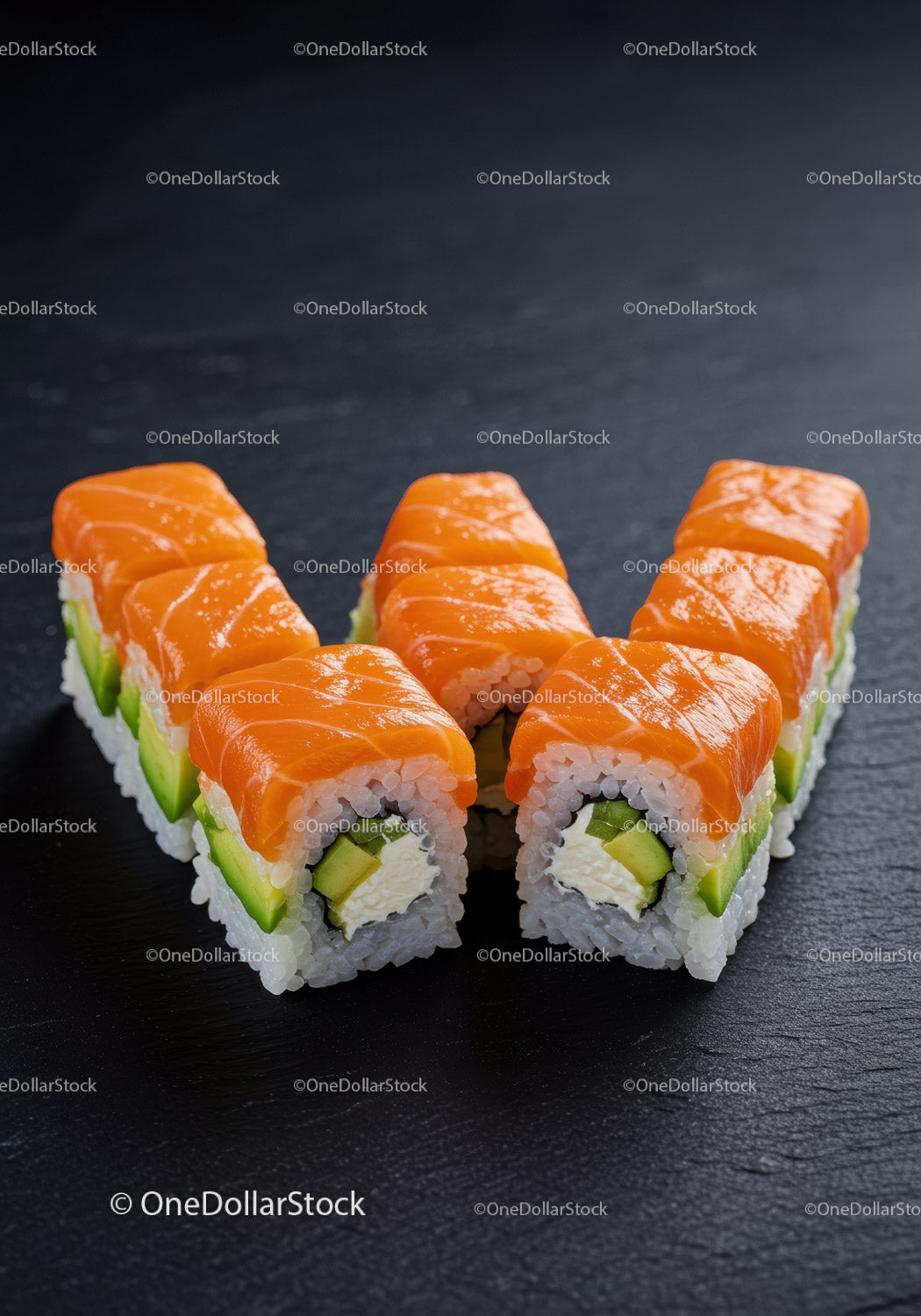Fresh salmon sushi rolls with avocado and cream cheese