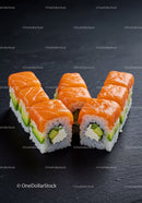 Fresh salmon sushi rolls with avocado and cream cheese