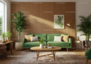Stylish green velvet sofa in bright modern living room