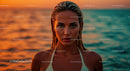 Close-Up of a Woman with Wet Hair and Water Droplets at Sunset