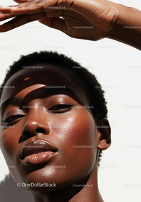 Close-Up Portrait of a Beautiful Woman with Radiant Skin