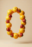 Fresh oranges and strawberries forming zero shape